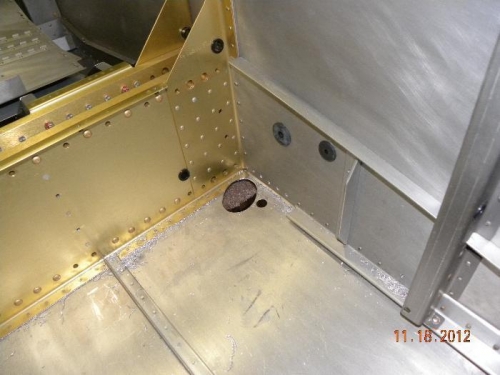 Cut holes in floor for leg penetration