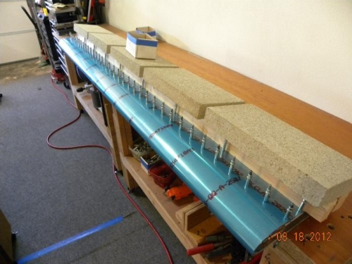 Flap Weighted down to table for drilling