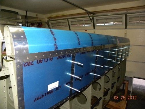 Leading edges riveted to main spar