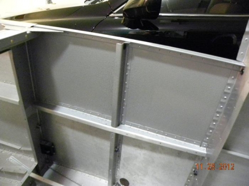 upper baggage compartment areas painted that are exposed