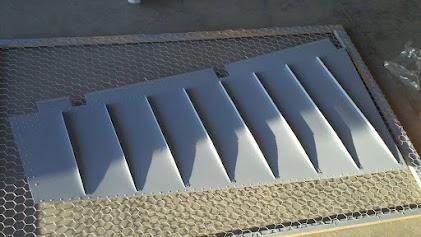 Right rudder skin with stiffners back riveted on.