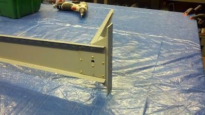 Lower rib and assc parts riveted together 1