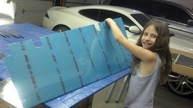 Gabriella deburring the right skin stiffner holes