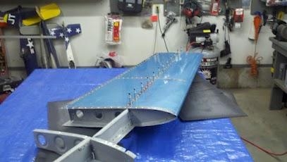 Left HS partially riveted to front spar and all left ribs