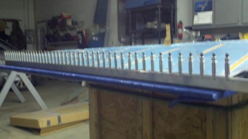 straight trailing edge clecoed to aluminum angle