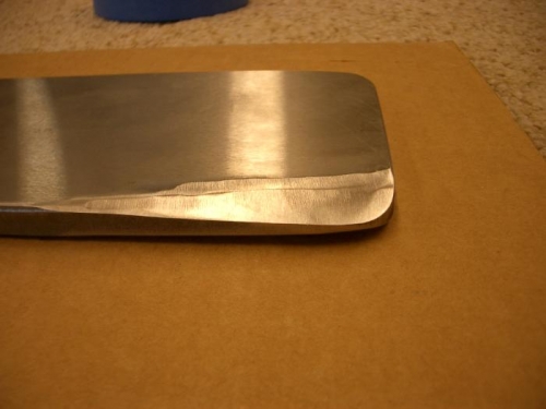 Tapered back bucking plate
