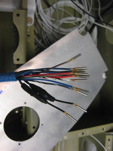 Female pins crimped on wires