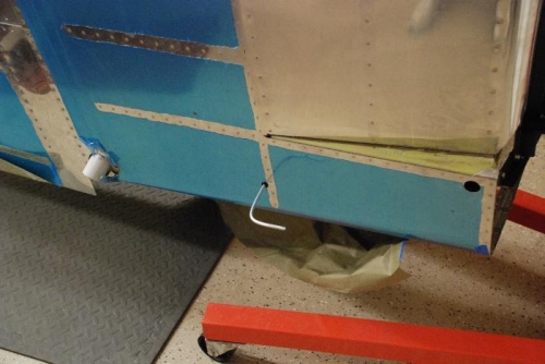Vent line exiting fuselage