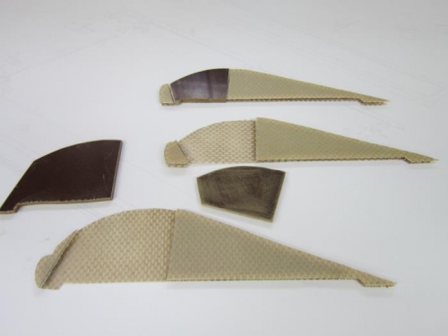 Flap ribs, with phenolic inserts, ready for bonding