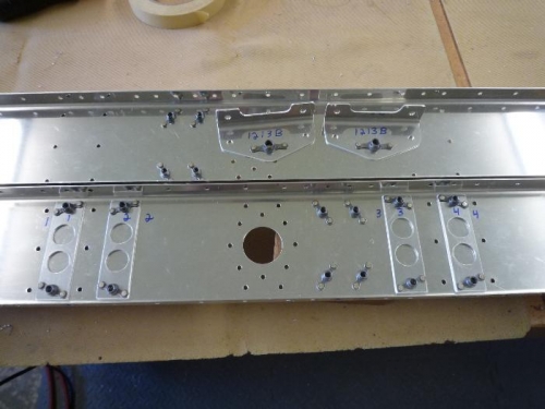 riveted nutplates for hinge brackets, control horns, & hinge brackets themselves.