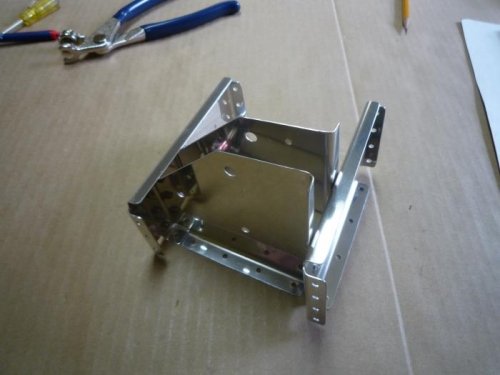 Riveted pulley bracket assembly