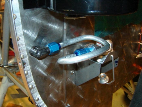 Fuel line through firewall