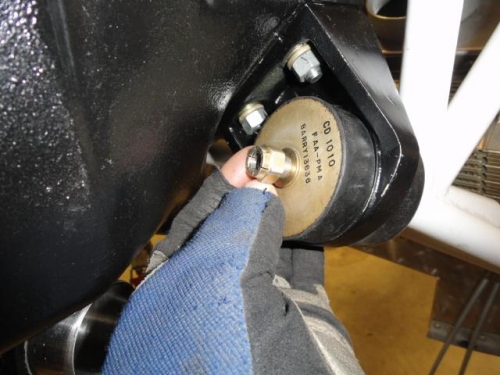 Install of nut on lower mount