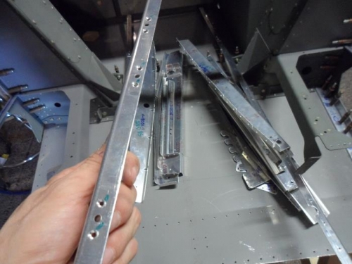 Machine countersinkin nutplate attachment rivet holes in the Arm Rest pieces.