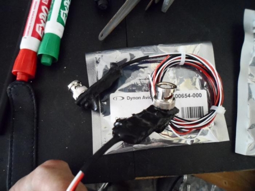 Liquid electric tape compound-covered converters