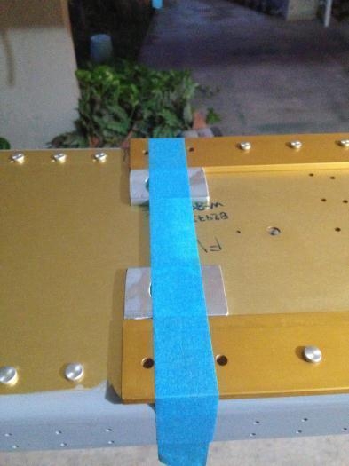 Painter's tape holding the spacers in place