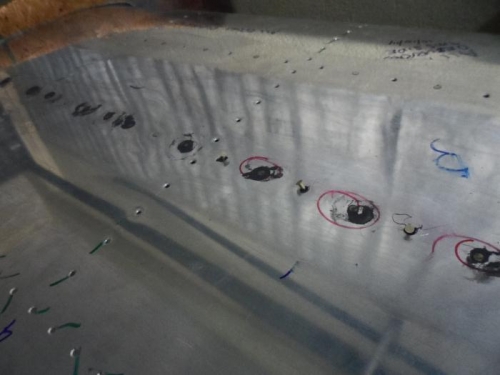 Wet riveting stiffeners rivets
