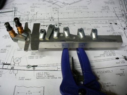 Handle components clamped to L angle.