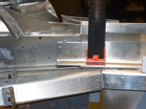Splice plate clamped in place