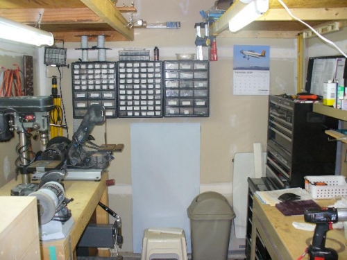 The garage has a nice 8 ft X 8 ft. alcove where I put all the workbenches, rivet organizers, tools etc