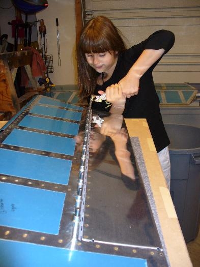 Sarah helping with clecoes as we attach the trim tab to the elevator