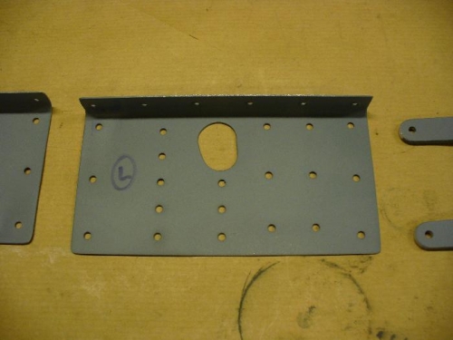 Spar doubler plate that reinforces aileron bracket attachment point.