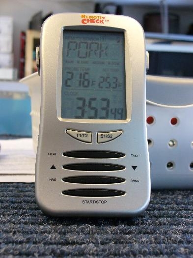 Man toy - Nice 2 probe remote thermometer to keep tabs on my slow smoked ribs while I work.