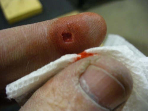 Ouch! Pinched off with a 3000 psi rivet squeezer.