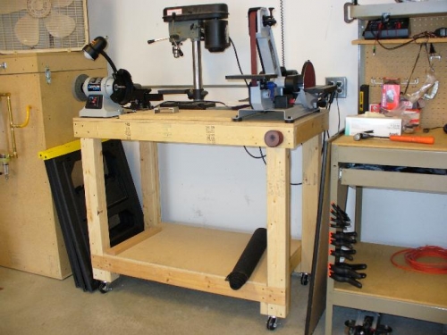 Fabrication and sanding/deburring done here. Bandsaw with metal cutting blade in basement.