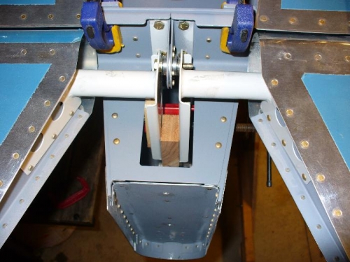 Elevator horns with wood drilling alignment block