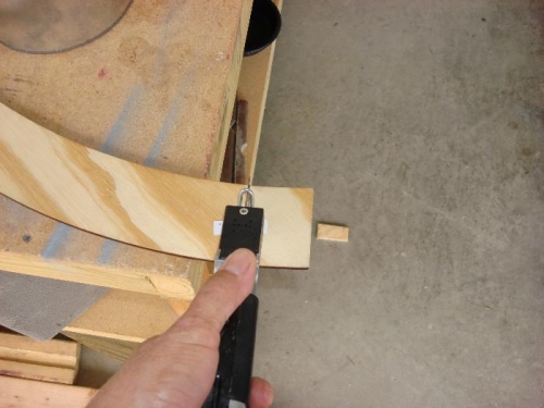 Cut the plywood Arch to fit inside the top and bottom brackets