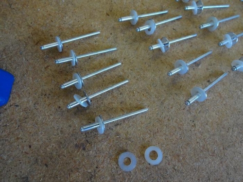 Placed Plastic Washers on each Rivet.