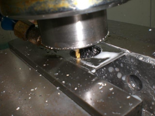 Machining the plate hole