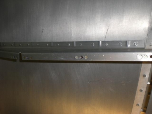 Nutplates installed in armrest