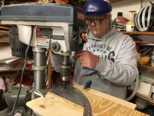Jim working the drill press CAREFULLY while cutting the hole