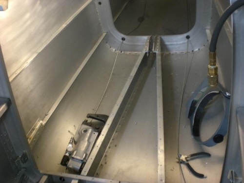 Baggage compartment skins removed