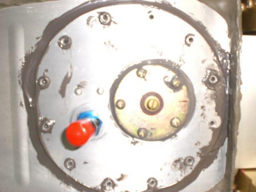 Tank access panel with all the Proseal goop