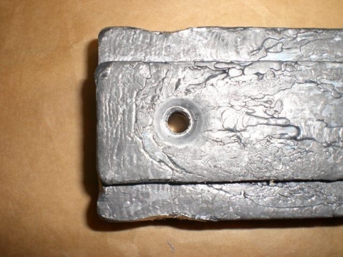 Lead counterbalance drilled and dimpled