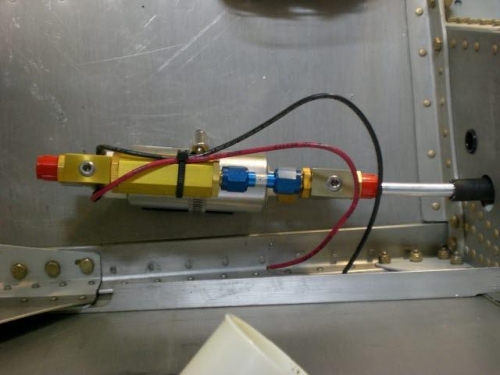 Connecting fuel pump line to locate pump bracket
