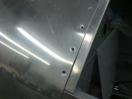 Removing rivets for shimming