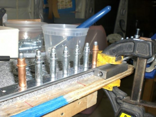 Canopy Rail Spacer being drilled