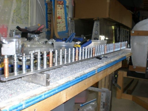 All holes drilled in the cap and spacer