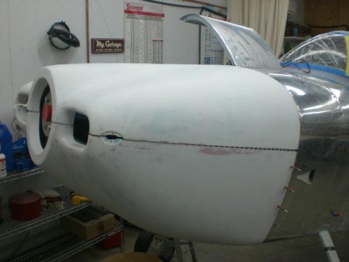Trial fitting of cowl on airplane