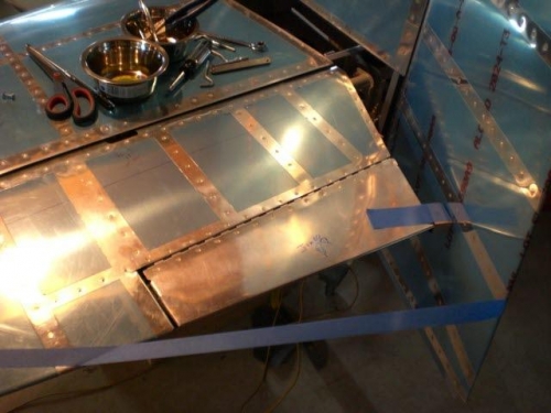 Used tape to hold rudder against wood spacer