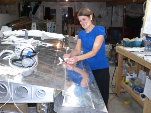 Kathryn inserting hinge pins