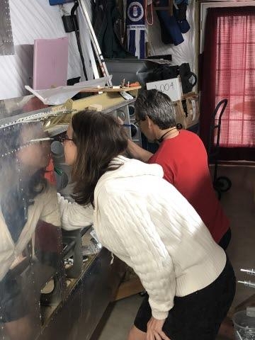 Marylou and Gerry plane signing