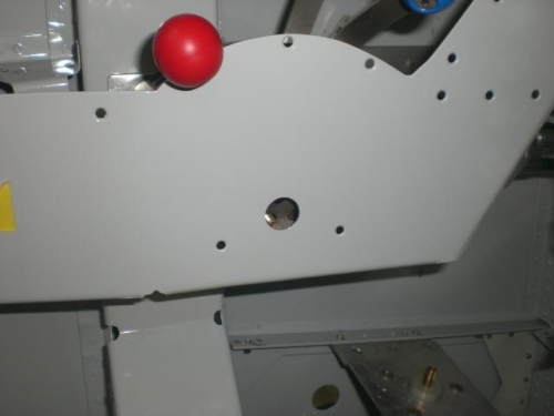 Hole drilled for throttle friction knob