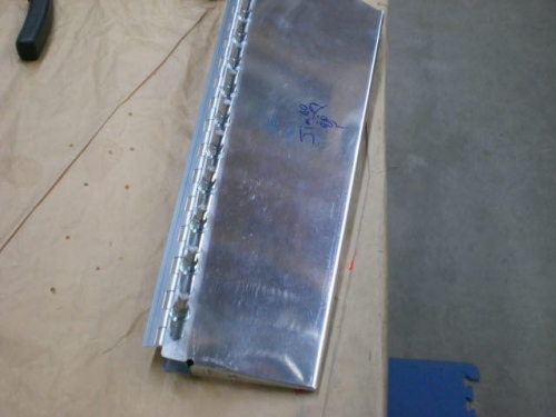 Trim tab hinge clecod