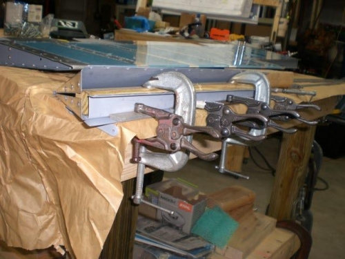 Re-aligning rivet holes in upper trim skin