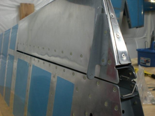 Trim tab attached(note hinge pin in bottom right of photo